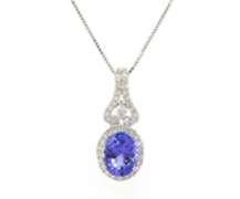 Romantic White Gold oval Tanzanite and Diamond Pendant