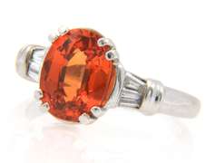 Fancy White Gold oval Orange Garnet and Baguette Diamond Ring