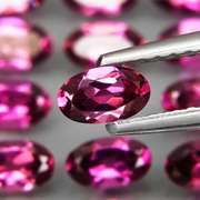 Ravishing 8.51ct violet pink Rhodolite Garnet set