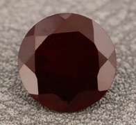 Ravishing 4ct black cherry red Mozambique Garnet solitaire