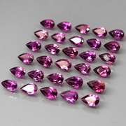 Ravishing 7.55ct violet pink Rhodolite Garnet set