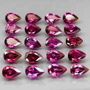 Premium pear cut 9.49ct VS Rhodolite Garnet set