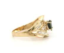 Handsome Yellow Gold oval Sapphire and Baguette Diamond Ring