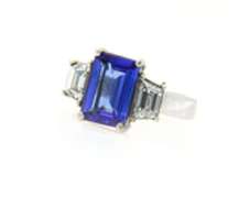 Quintessential Emerald Cut Tanzanite and Trapezoid Diamond Ring