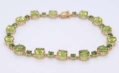 Powerful Yellow Gold Peridot and Tsavorite Bracelet