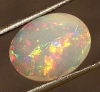 Wonderful glittering 2.05ct faceted Jelly Opal