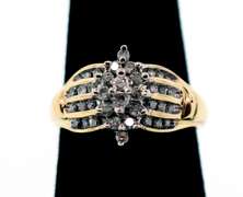 Holistic 10k Gold Ring Flanked by Channel Set Diamonds