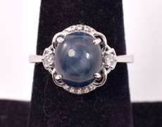 Gorgeous 4.94CTS Cabochon-Cut Star Sapphire & 0.11CTW Diamond Ring in Sterling Silver