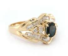 Handsome Yellow Gold oval Sapphire and Baguette Diamond Ring