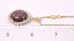 Sensational 23.51CTS Cabochon-Cut Star Ruby & 2.40CTW White Topaz Pendant Necklace in Gold Plated Sterling Silver