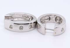 Attractive White Gold 3 Stone Diamond oval Huggies
