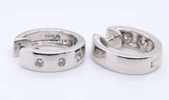 Attractive White Gold 3 Stone Diamond oval Huggies