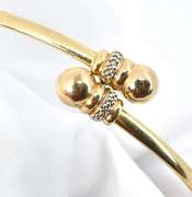 Practical 14k Flexible Bangle