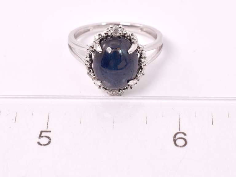 Gorgeous 6.65CTS Cabochon Cut Star Sapphire & 0.09CTW Diamond Ring in Sterling Silver