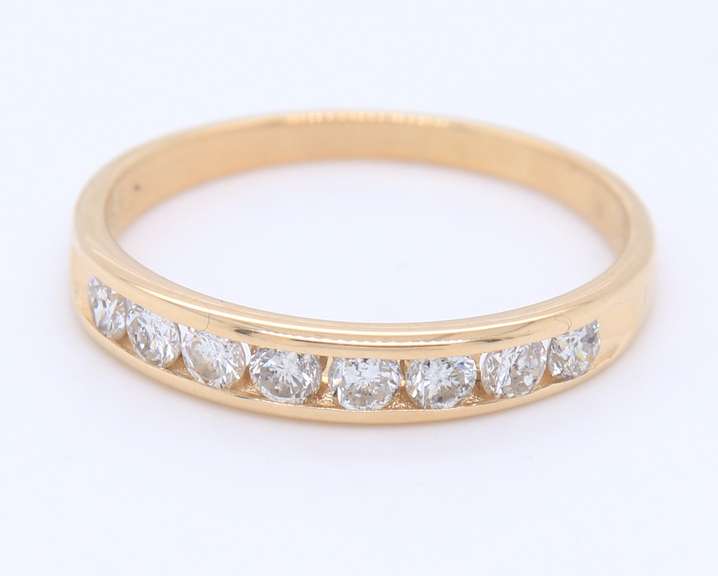 Favorite Yellow Gold Channel Set Diamond Band
