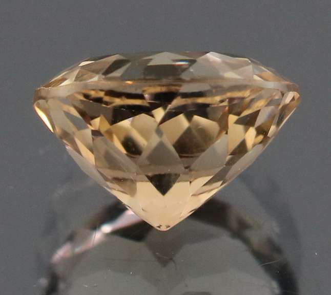 Exciting 3.34ct 9mm champagne Imperial Topaz solitaire