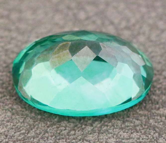 Attention grabbing 7.97ct emerald green Mystic Topaz