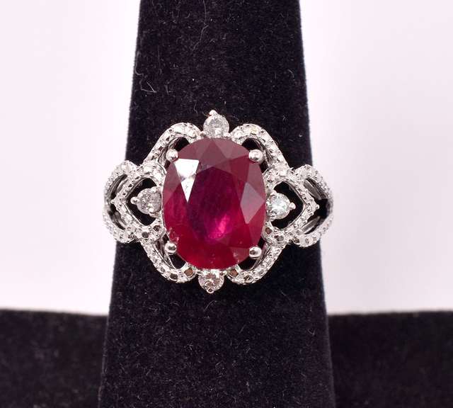 Mesmerizing 4.32CTS Ruby and 0.18CTW Diamond Ring in Sterling Silver