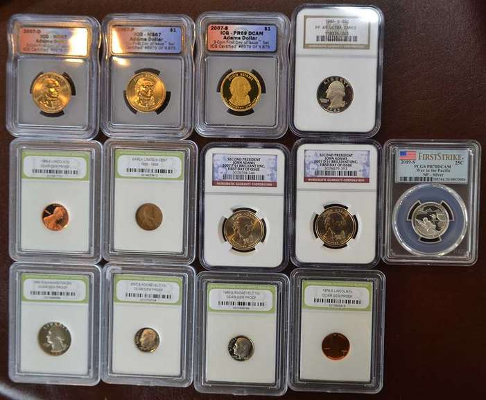 Lot Of 13 Coins In Plastic Holders.