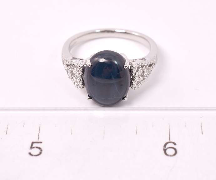 Brilliant 7.32CTS Cabochon-Cut Star Sapphire & 0.08CTW Diamond Ring in Sterling Silver