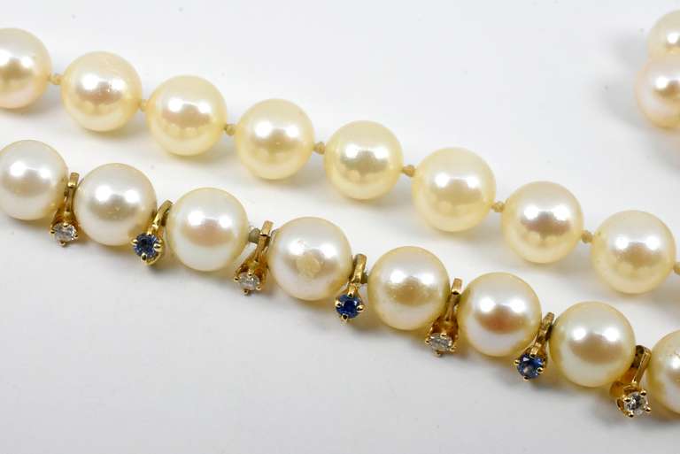 Long Strand of 8mm Pearls with Diamond Accents