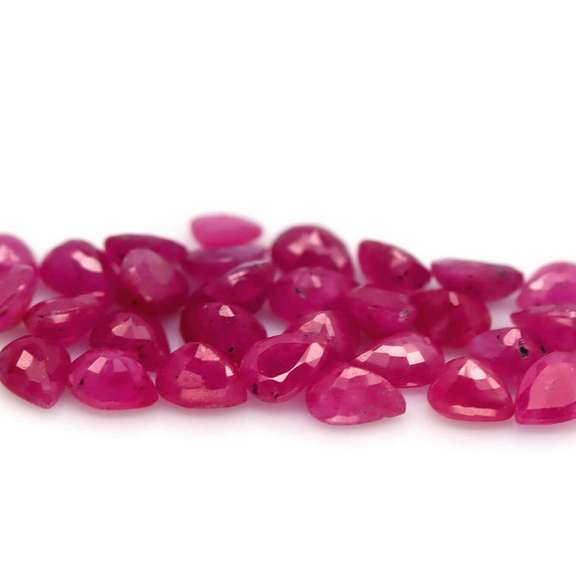 Heated only! 12.36ct violet red Ruby set