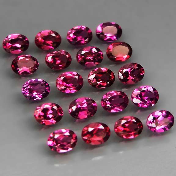 Amazing 4.41ct oval cut violet pink Rodolite Garnet set