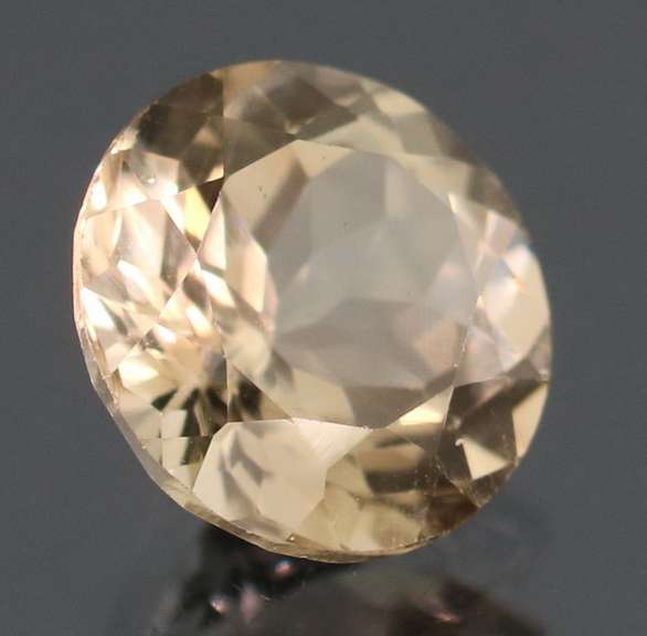 Exciting 3.34ct 9mm champagne Imperial Topaz solitaire