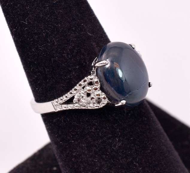 Brilliant 7.32CTS Cabochon-Cut Star Sapphire & 0.08CTW Diamond Ring in Sterling Silver