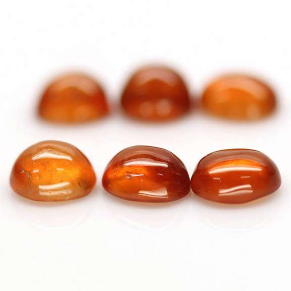 Fantastic richly colored 10.2ct Hessonite Garnet set