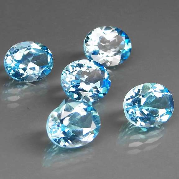Large 15.62ct vivid Swiss blue Topaz set