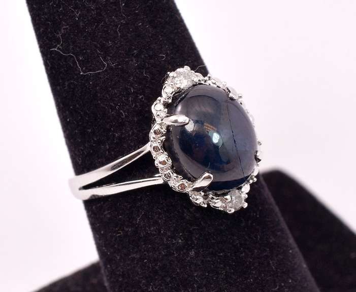 Wonderful 6.65CTS Sapphire and 0.09CTW Diamond Ring in Sterling Silver