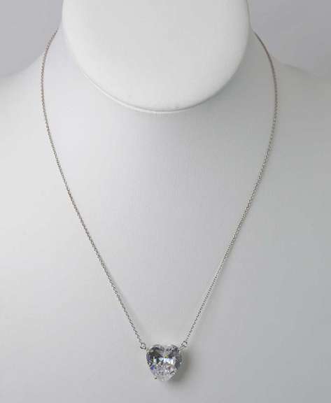 Bright CZ Set In A Sterling Silver Pendant On A Sterling Silver Chain.