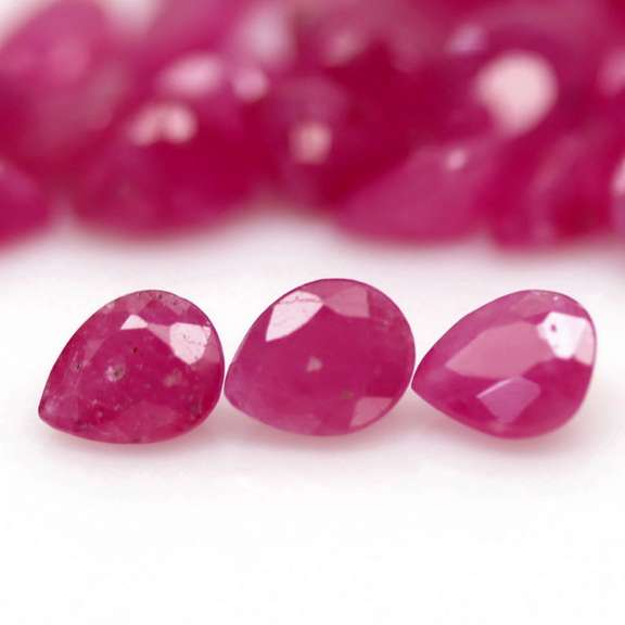 Heated only! 11.94ct pear cut pink Ruby set