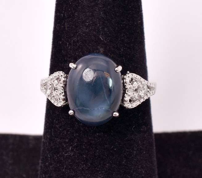 Brilliant 7.32CTS Cabochon-Cut Star Sapphire & 0.08CTW Diamond Ring in Sterling Silver