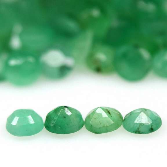Rich green unheated 6.98ct Emerald set