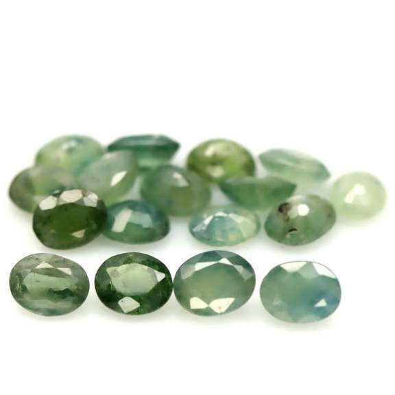 Fantastic 8.20ct green Sapphire set