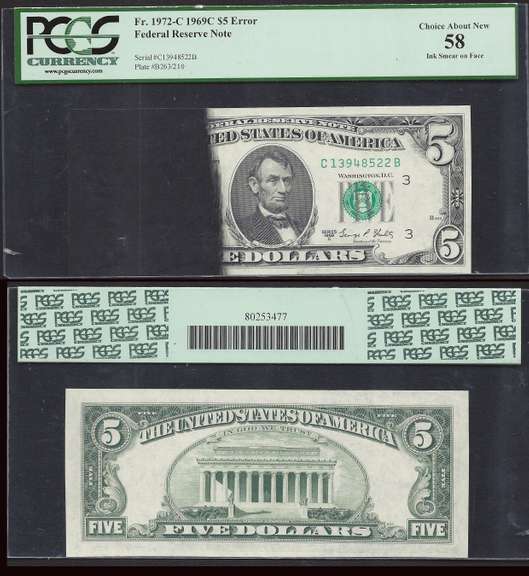 $5 1969-C FRN Major Ink Smear covering half of the front of the note. PCGS 58