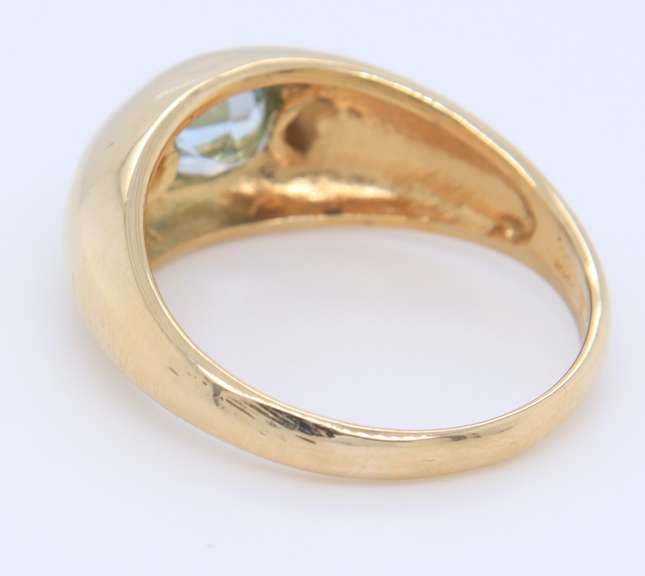 Handsome Yellow Gold oval Blue Topaz Bezel Set Ring