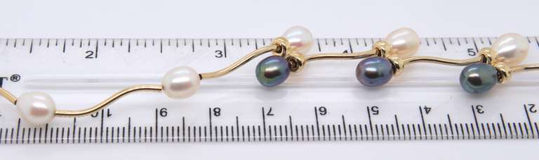 Favorite Black and White Pearl Swirl Yellow Gold Necklace