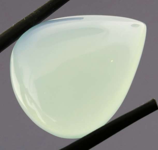 Glowing 22.77ct untreated Chalcedony cabochon
