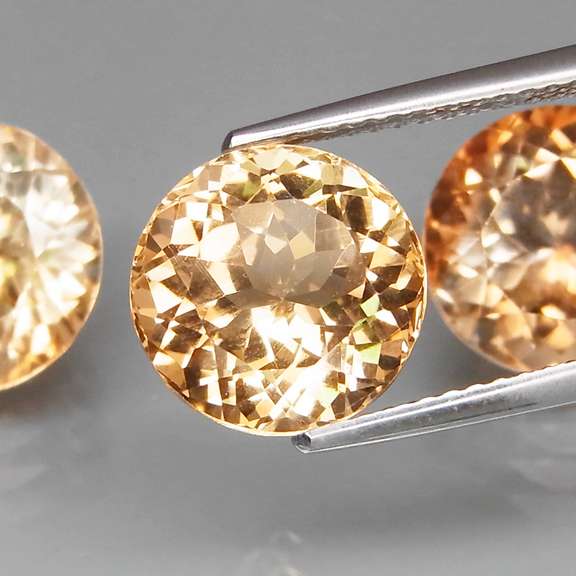 Matched! 3 piece 15.85ct full fire Imperial Topaz set