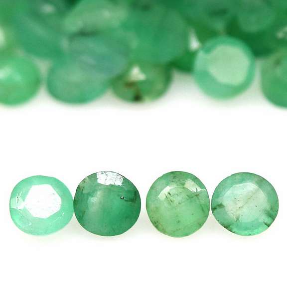 Rich green unheated 6.98ct Emerald set