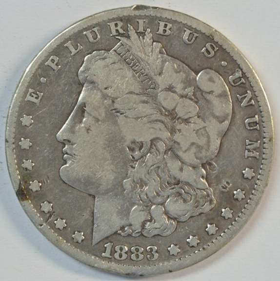 Scarce key date 1883-CC Morgan Silver Dollar