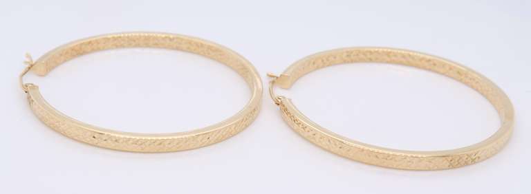 Beautiful Yellow Gold Diamond Cut Large Hoop Earrings