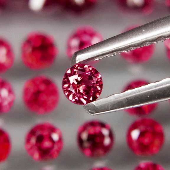 Ravishing 7.62ct violet red Rhodolite Garnet set