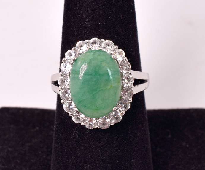 Captivating 5.08CTS Emerald and White Topaz Ring in Sterling Silver