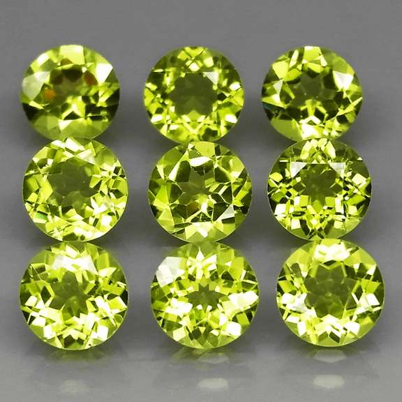 Dazzling 7.98ct untreated apple green Peridot set