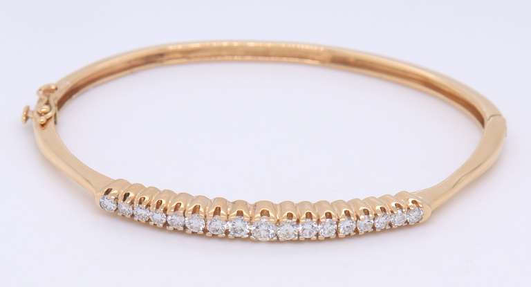 Attractive Yellow Gold Graduated Diamond Bangle Bracelet