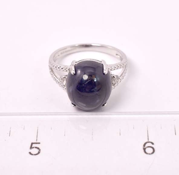 Captivating 9.27CTS Sapphire & 0.11CTW Diamond Ring in Sterling Silver